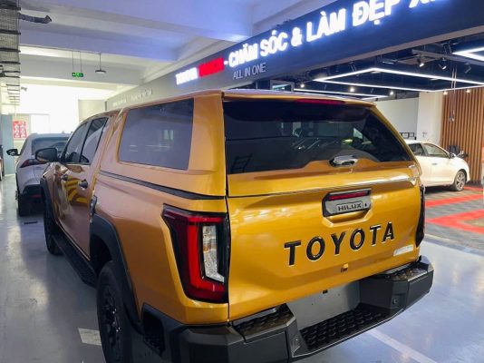Lắp nắp thùng Toyota Hilux có cần khoan xe không